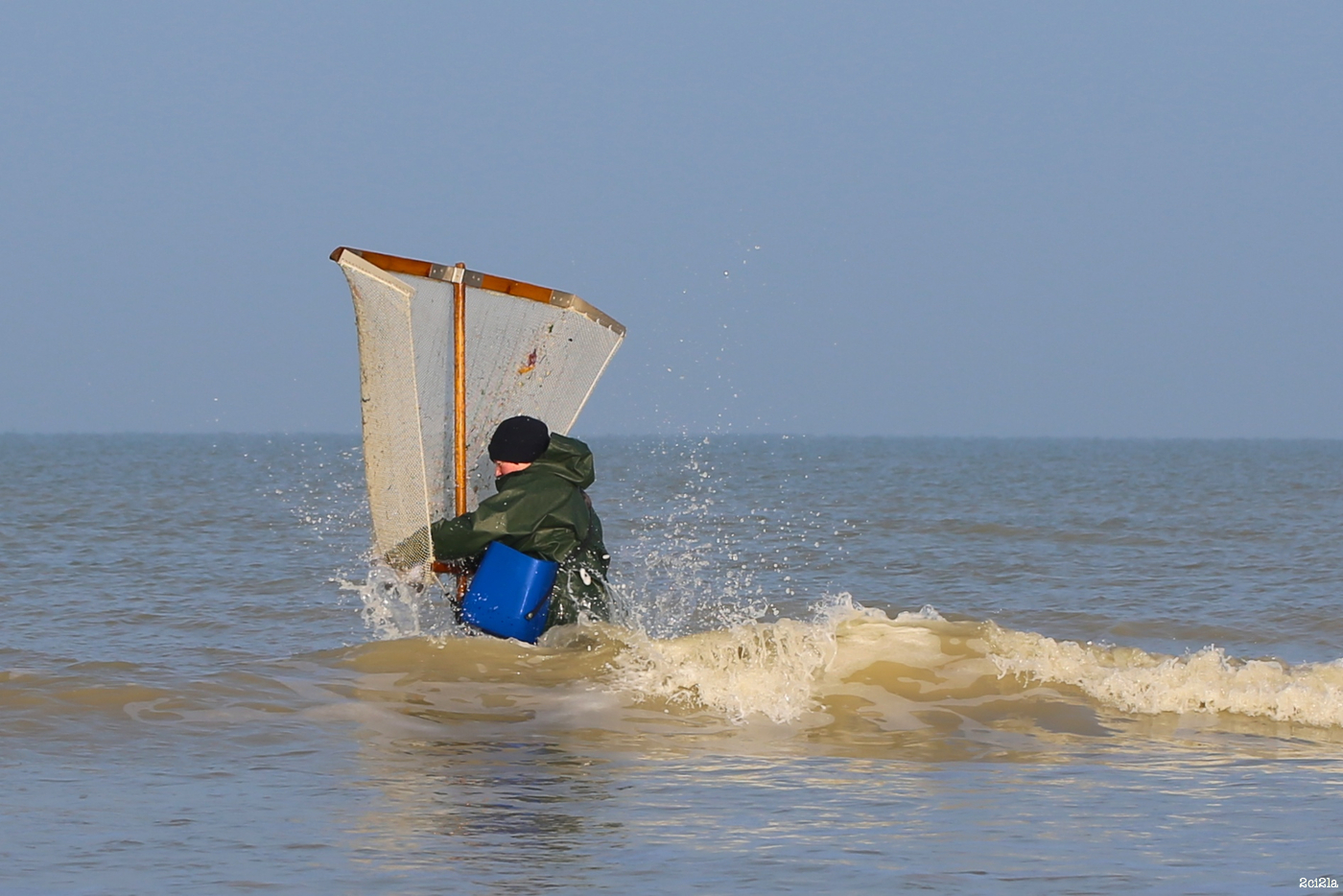 Pêcheur au pousseux